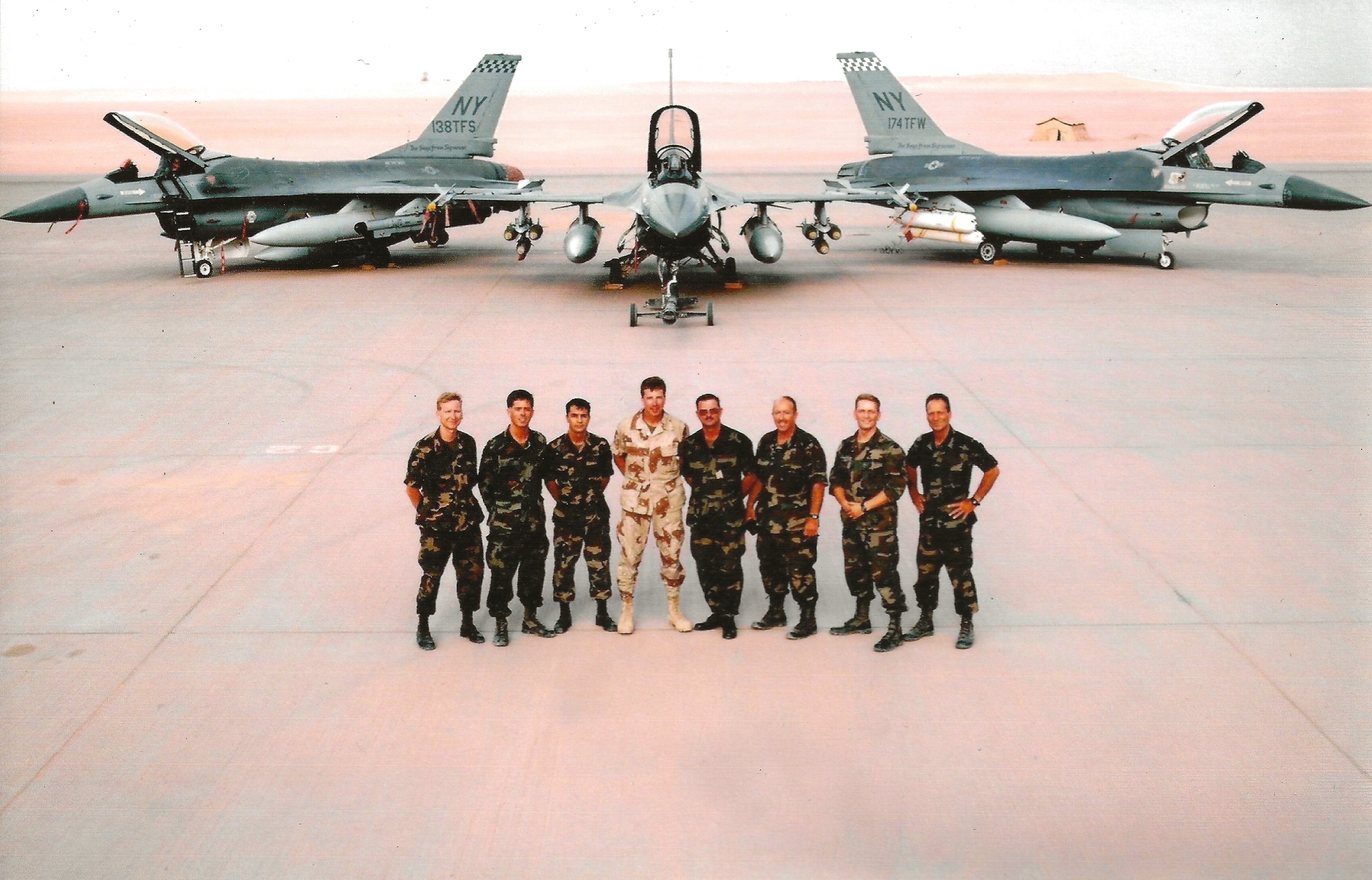 Battle Tested Coffee Company founder and team in front of F-16 fighter jets, Operation Desert Storm 1991